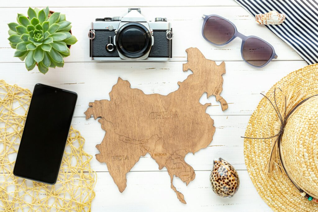 Concept Tourist destinations to Asian tropical countries. Flat lay.