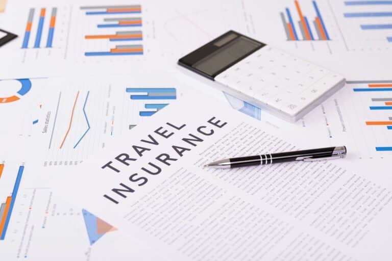 travel insurance concept, documents on the desktop